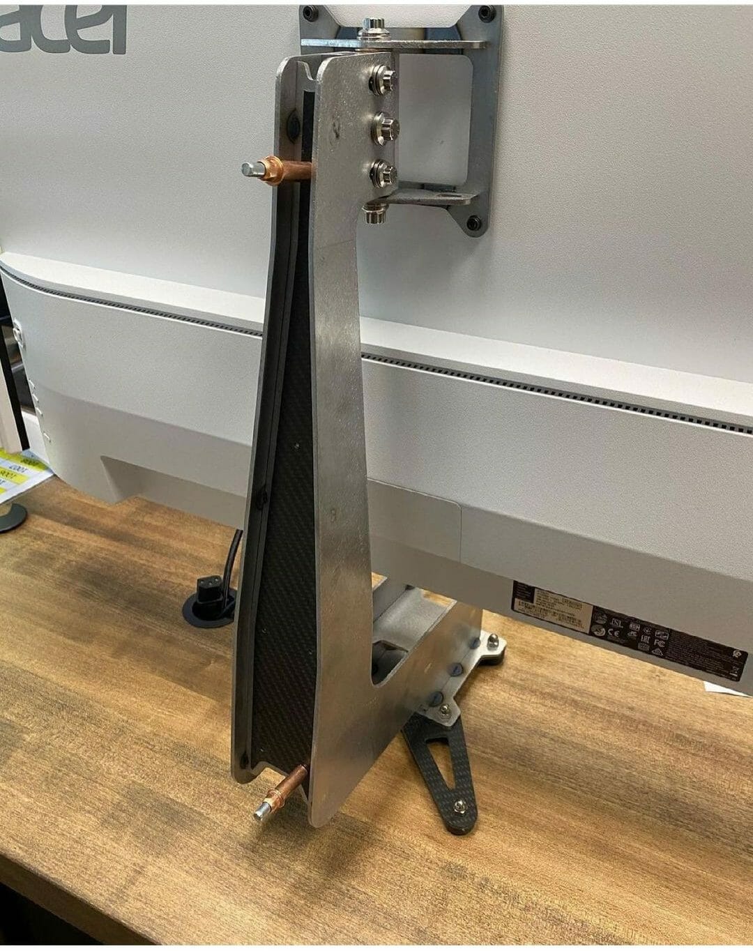 Laser cut stand for desktop computer