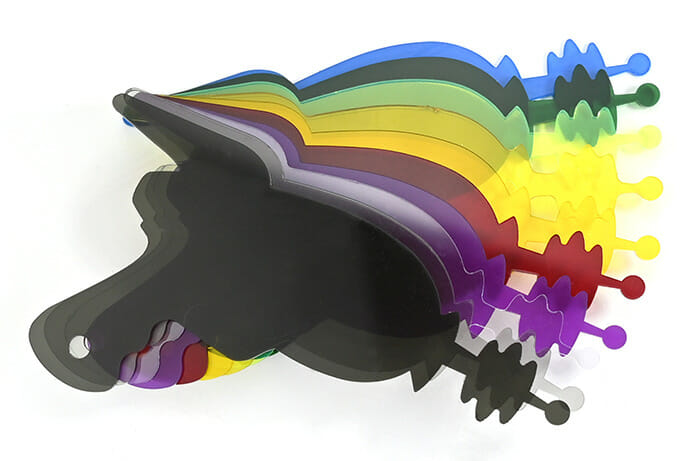 An array of custom cut laser in multi-colored acrylic