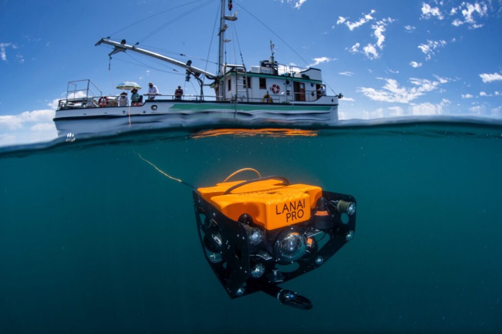 Custom-built underwater ROV deployed for inspection work, manufactured with SendCutSend laser-cut aluminum and HDPE plastic parts.